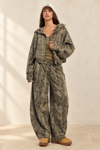 Alina Pants styled against warm ivory plaster and limestone