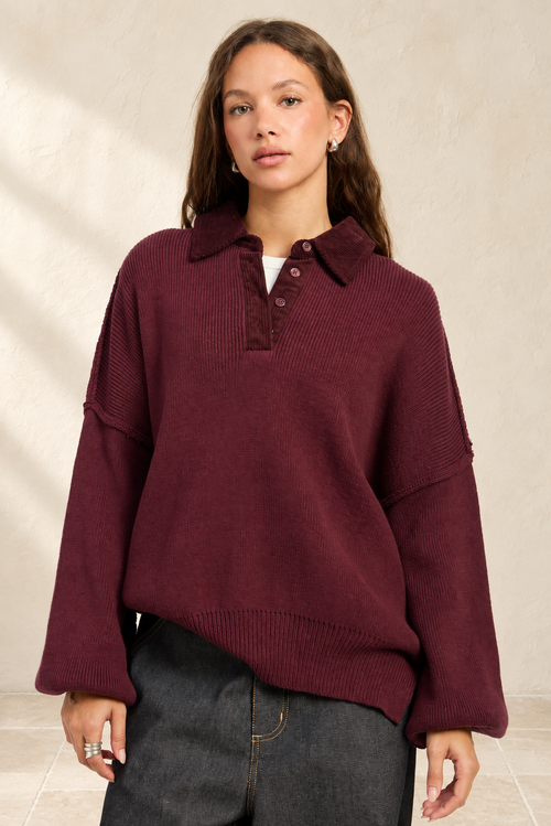 Arantxa Sweater styled against warm ivory plaster and limestone