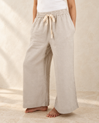 Ava Wide Leg Linen Pant styled against warm ivory plaster and limestone