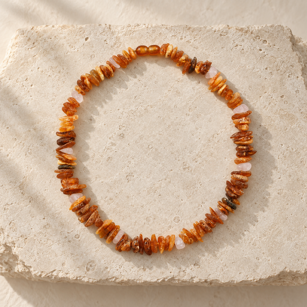 Baltic Amber + Rose Quartz Pet Necklace styled on a warm ivory and limestone Oak & Row backdrop