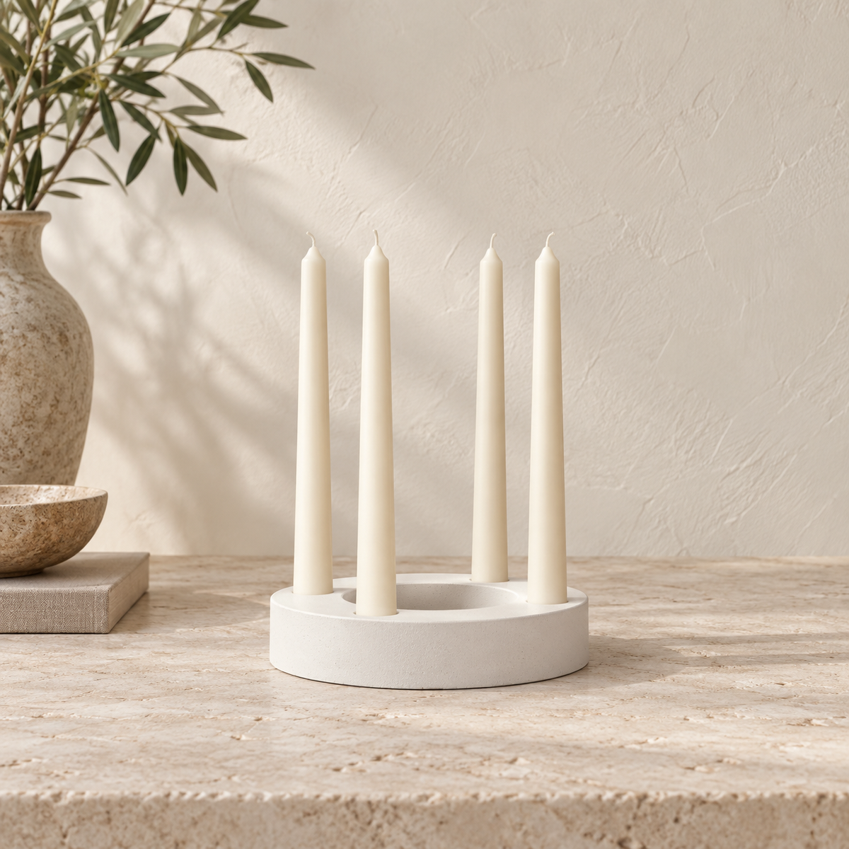 Halo Sculptural Candleholder styled on a warm ivory and limestone Oak & Row backdrop