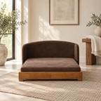The Haven Solid Wood Dog Bed styled on a warm ivory and limestone Oak & Row backdrop