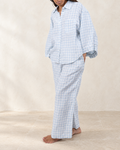 Vivian Linen Loungewear Set styled against warm ivory plaster and limestone