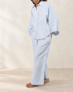 Vivian Linen Loungewear Set styled against warm ivory plaster and limestone