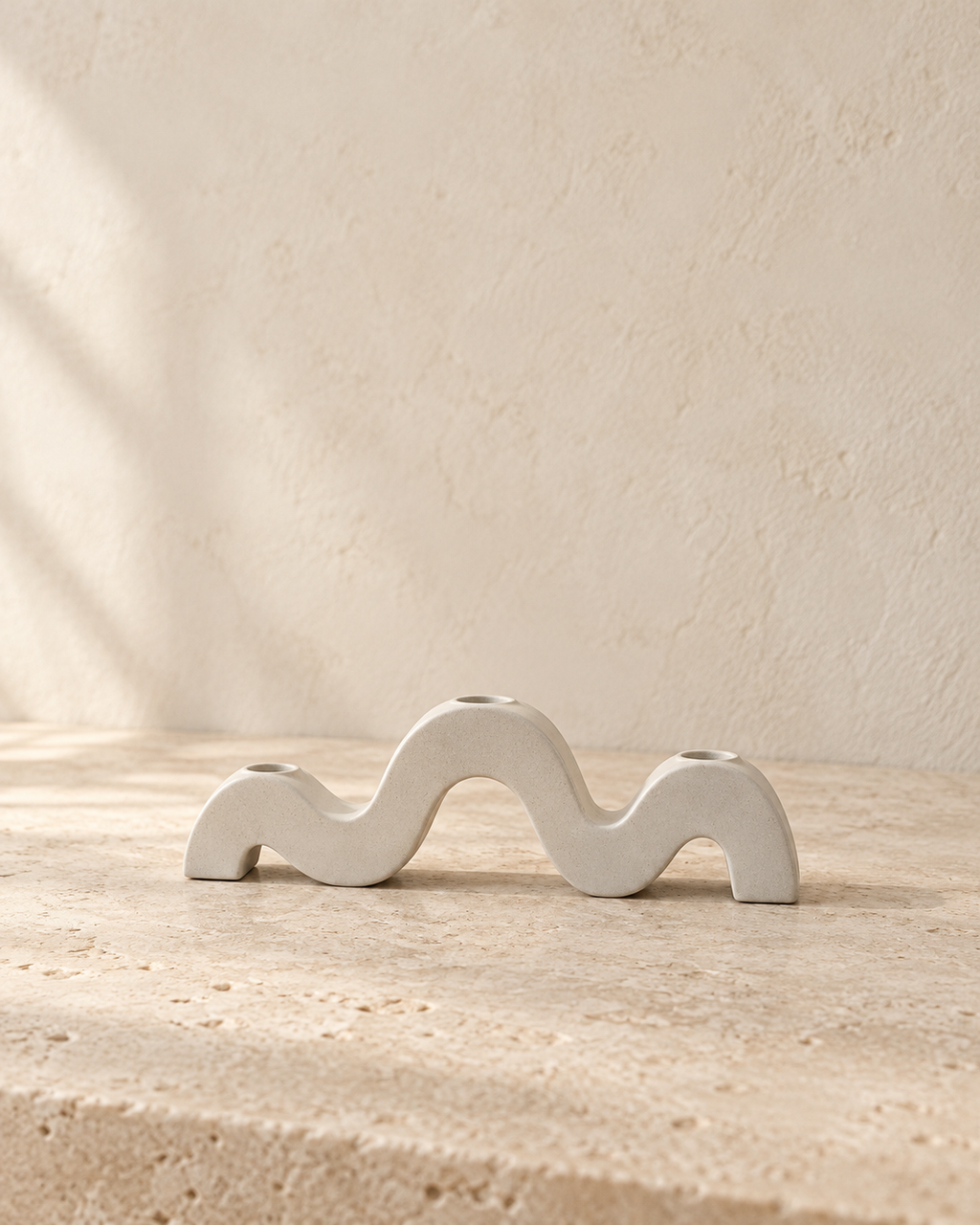 Wave Sculptural Candleholder detail on warm limestone