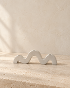 Wave Sculptural Candleholder detail on warm limestone