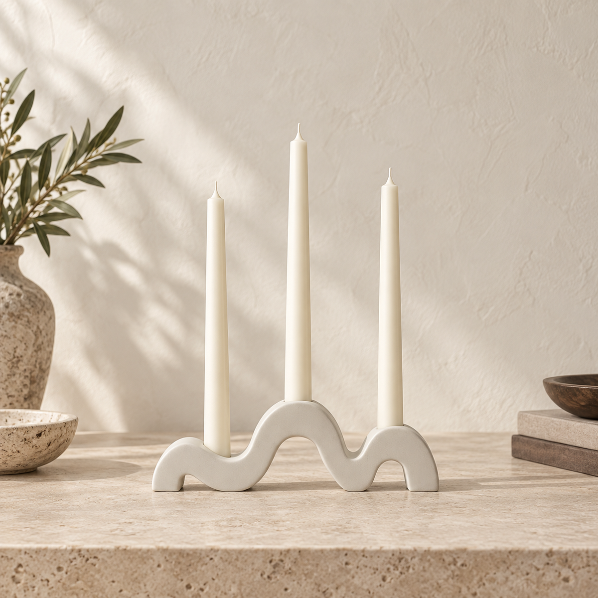 Wave Sculptural Candleholder styled on a warm ivory and limestone Oak & Row backdrop